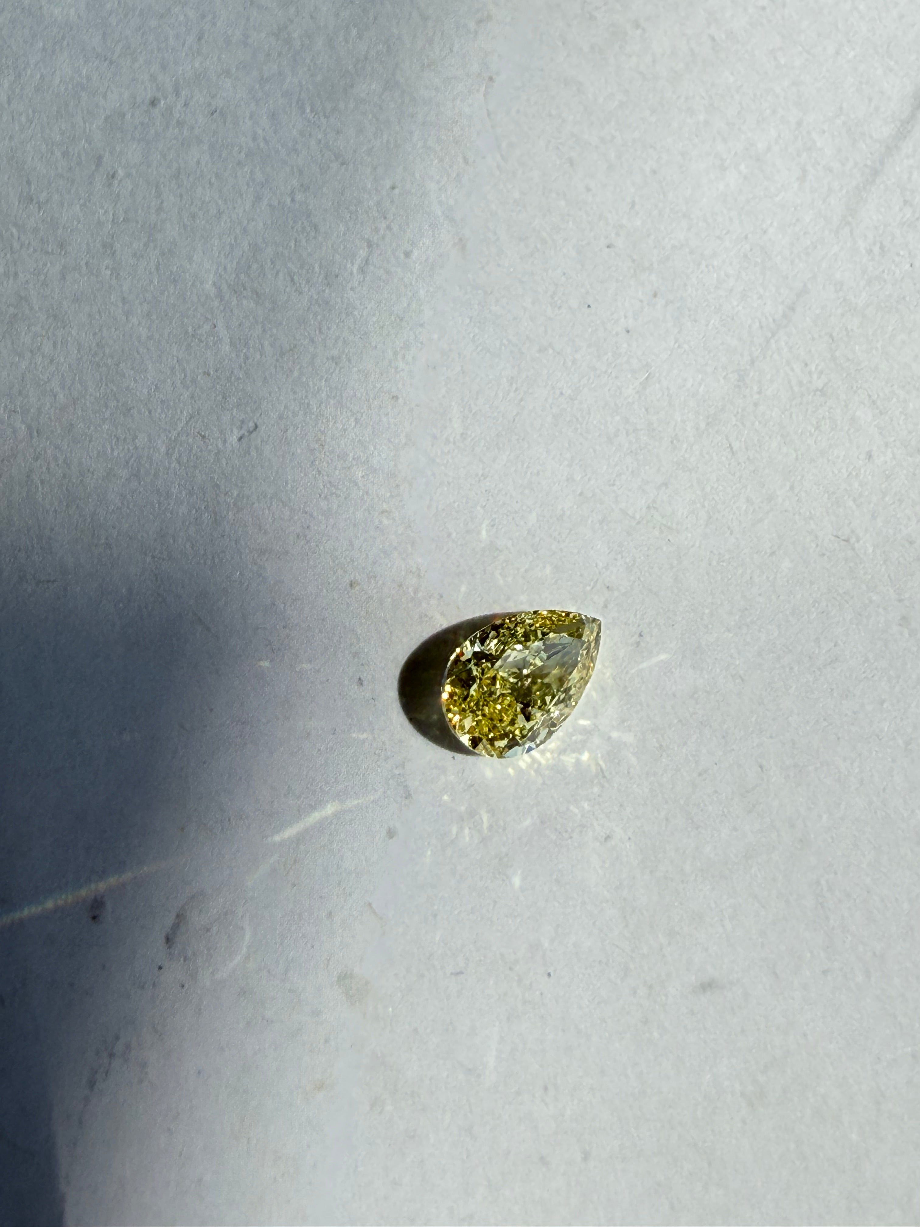 0.50ct fancy yellow pear diamond