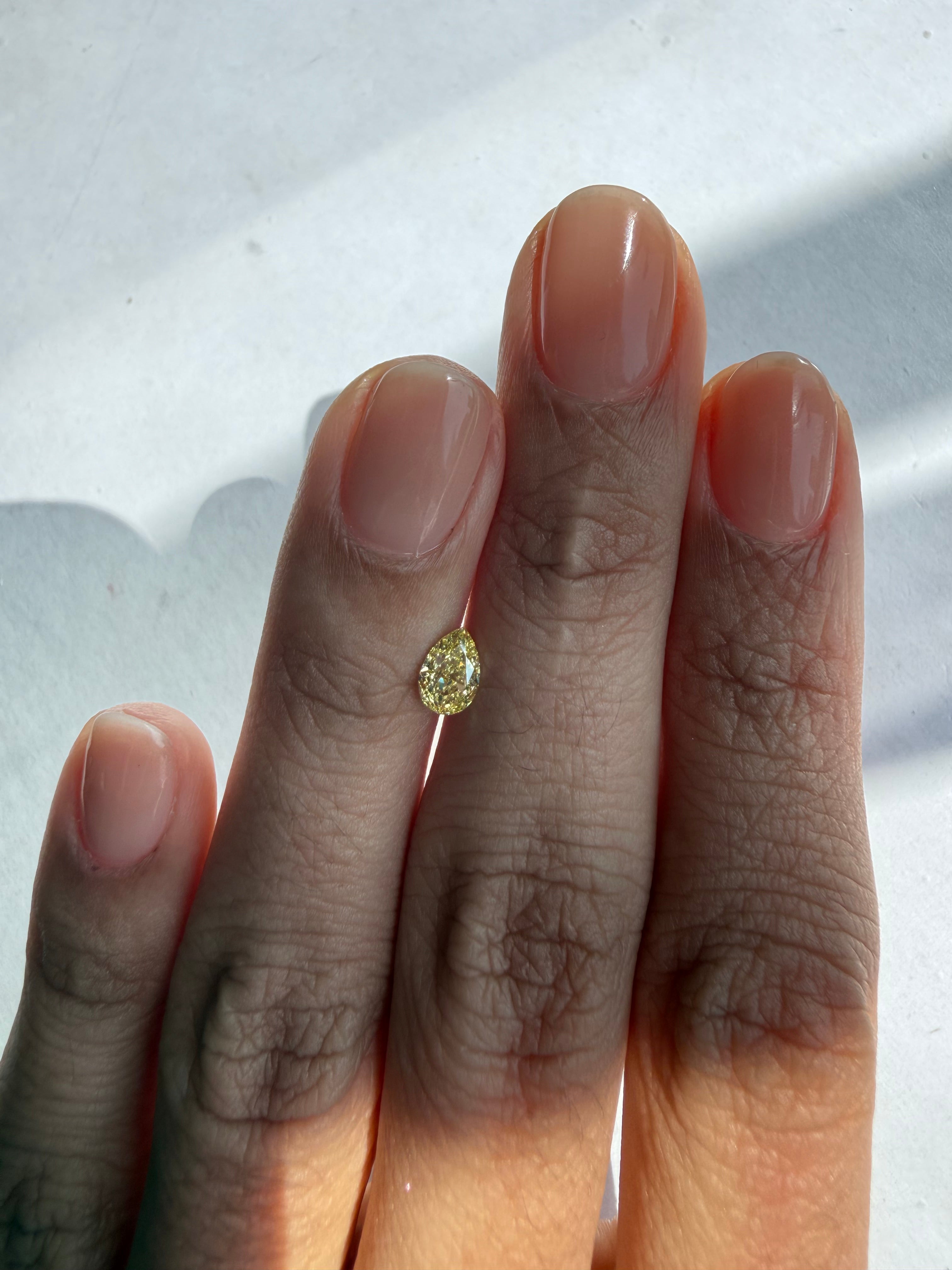 0.50ct fancy yellow pear diamond