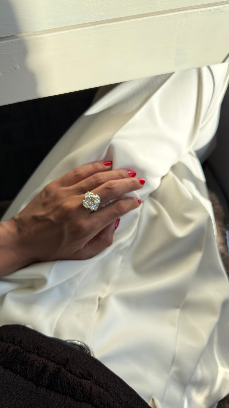 8CT OVAL DIAMOND RING WITH HALF MOONS ON HAND