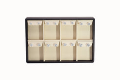 Assortment of diamond stud earrings on a display