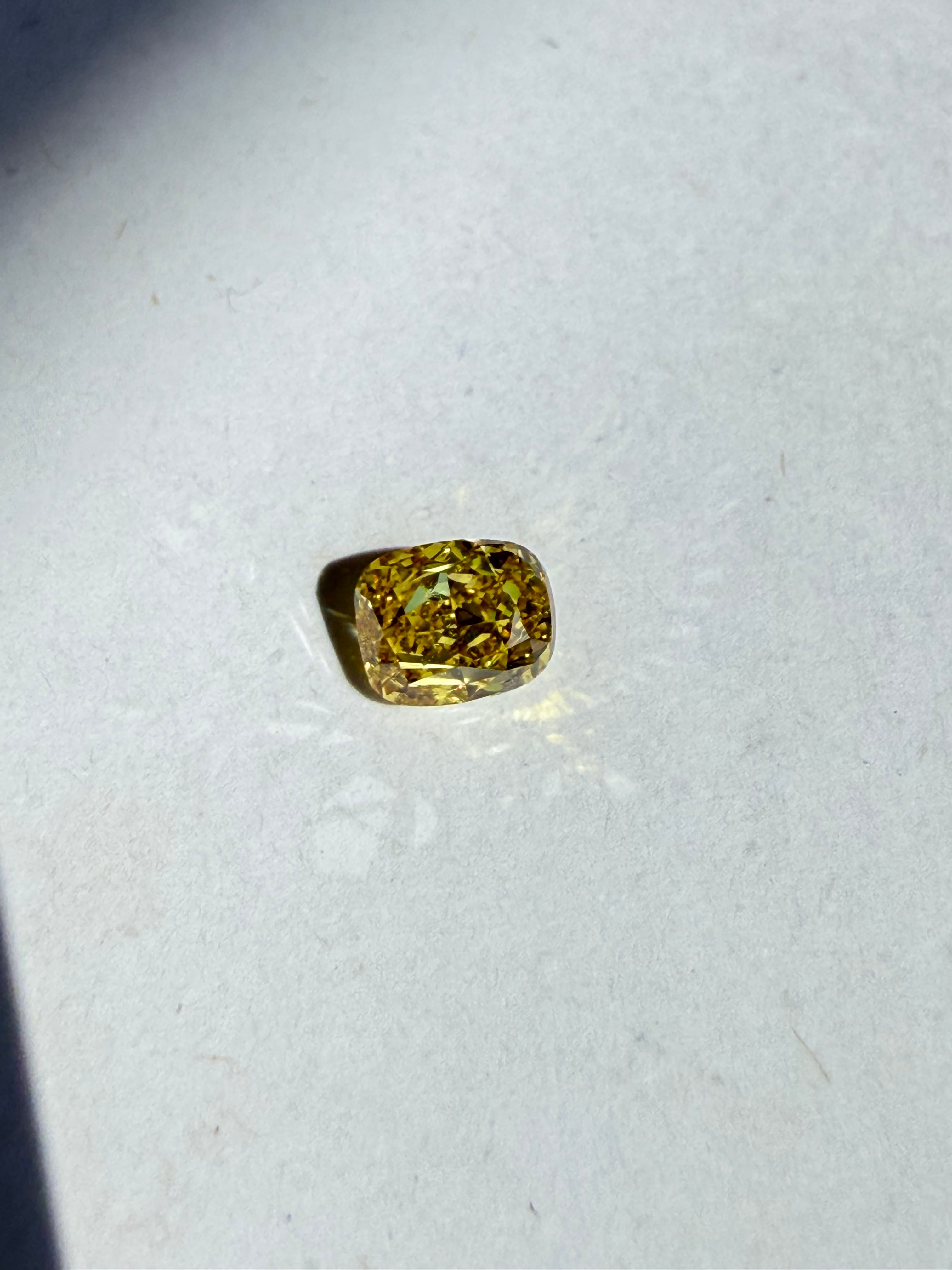 1ct fancy vivid orangy-yellow cushion