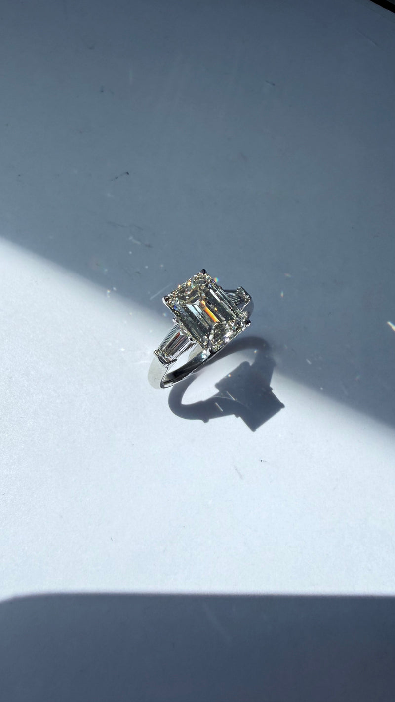 3CT EMERALD DIAMOND RING WITH TAPERED BAGUETTES PLATINUM