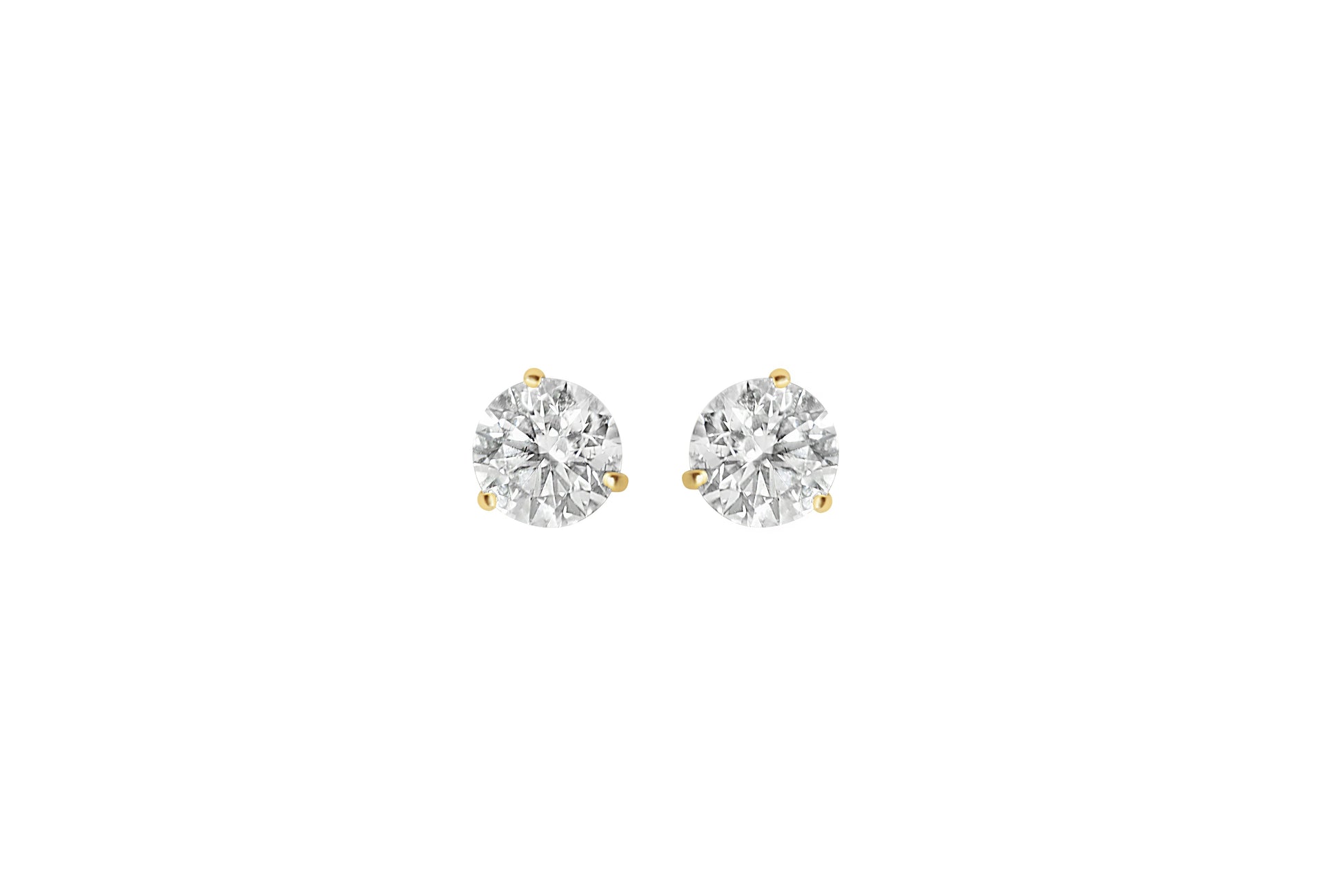 Pair of gold diamond stud earrings on a white background