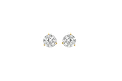 Pair of gold diamond stud earrings on a white background