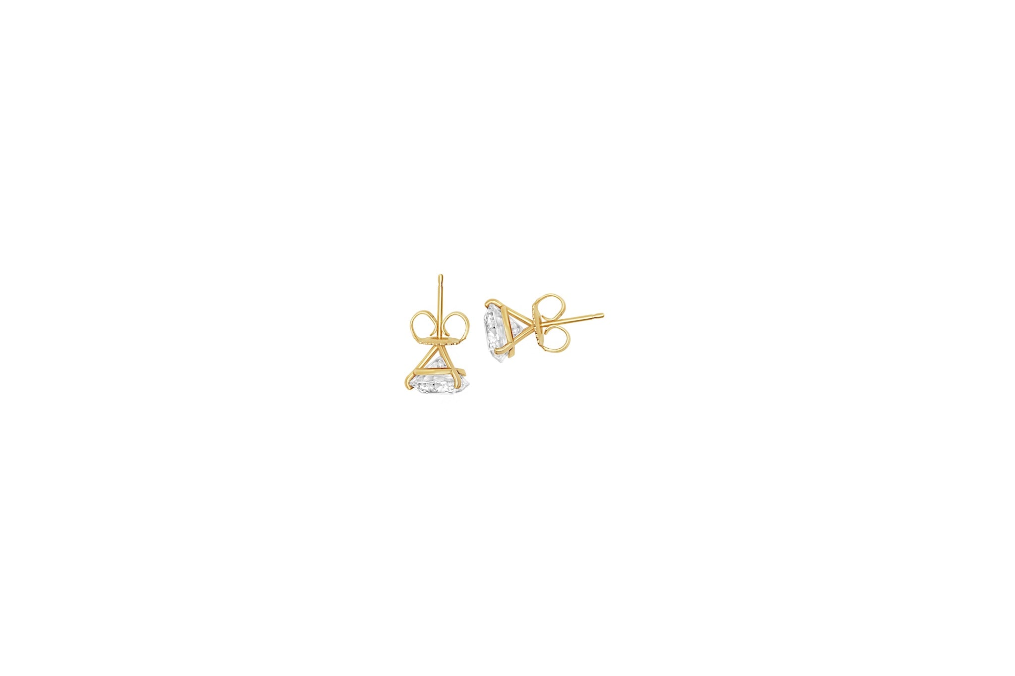 Pair of gold diamond stud earrings on a white background