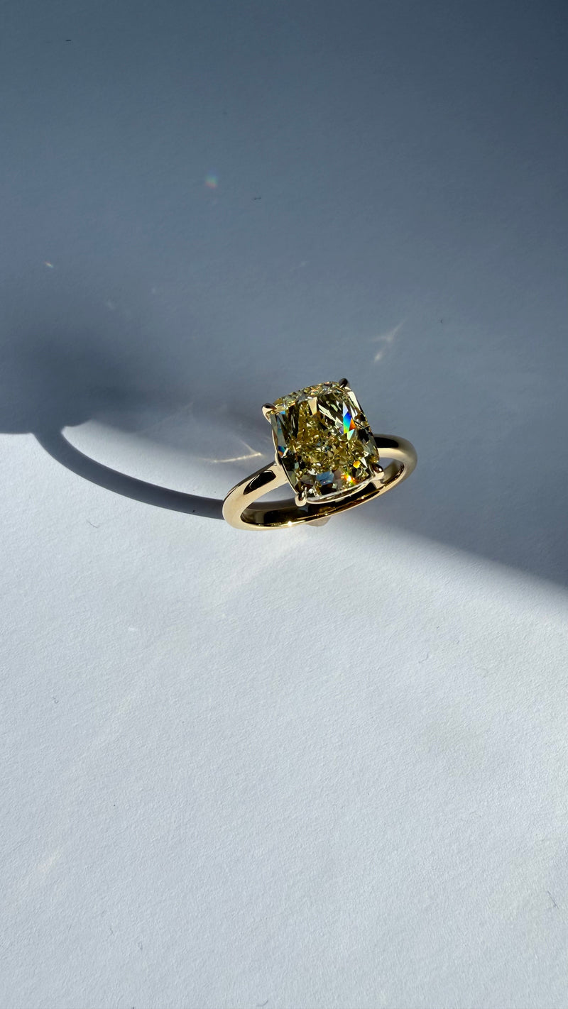 4CT FANCY LIGHT YELLOW CUSHION DIAMOND RING
