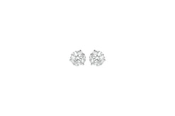 Pair of diamond stud earrings on a white background