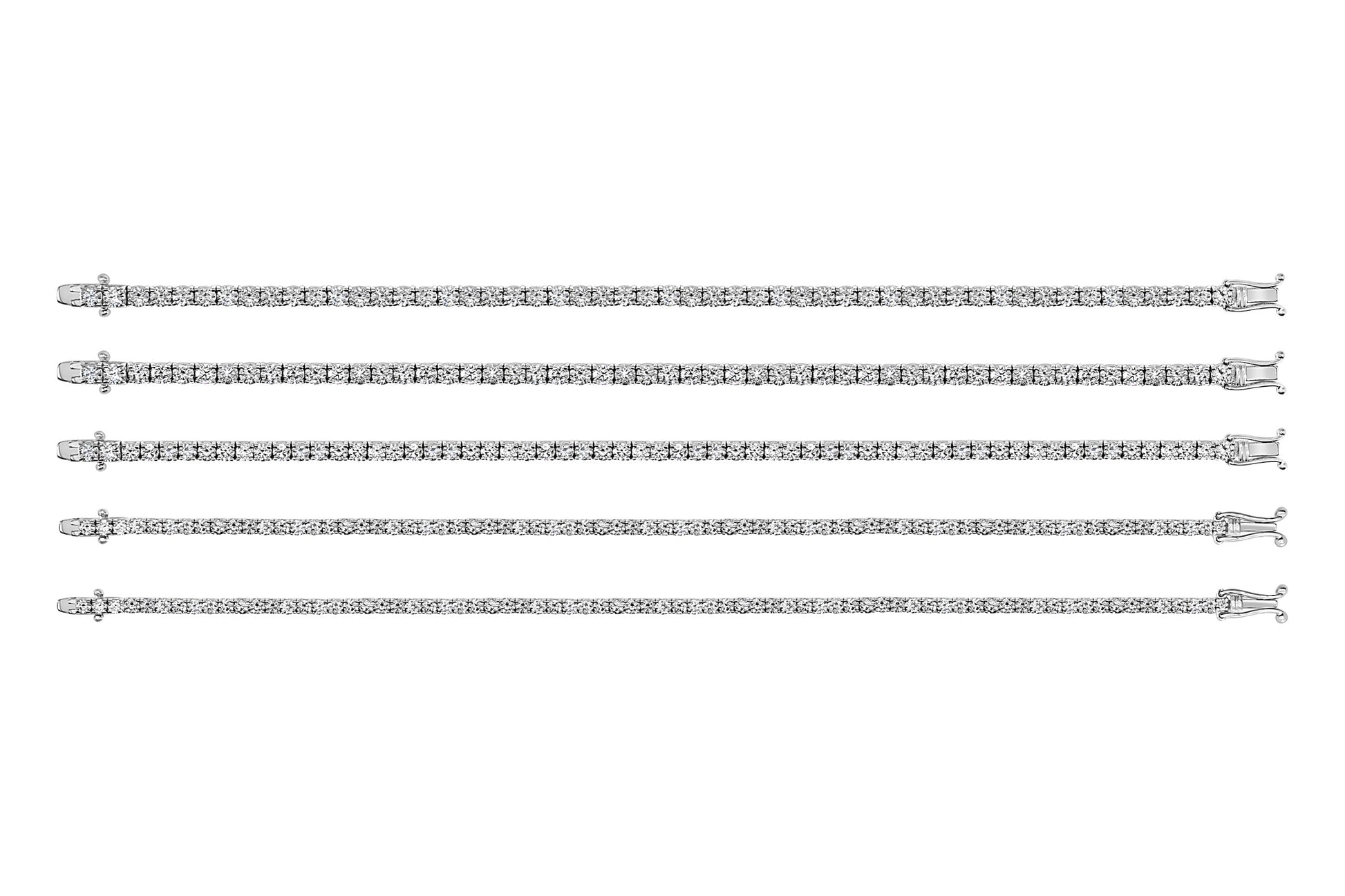 Set of white gold tennis bracelets on a white background