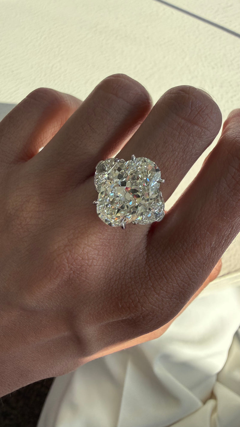 8CT OVAL DIAMOND RING WITH HALF MOONS