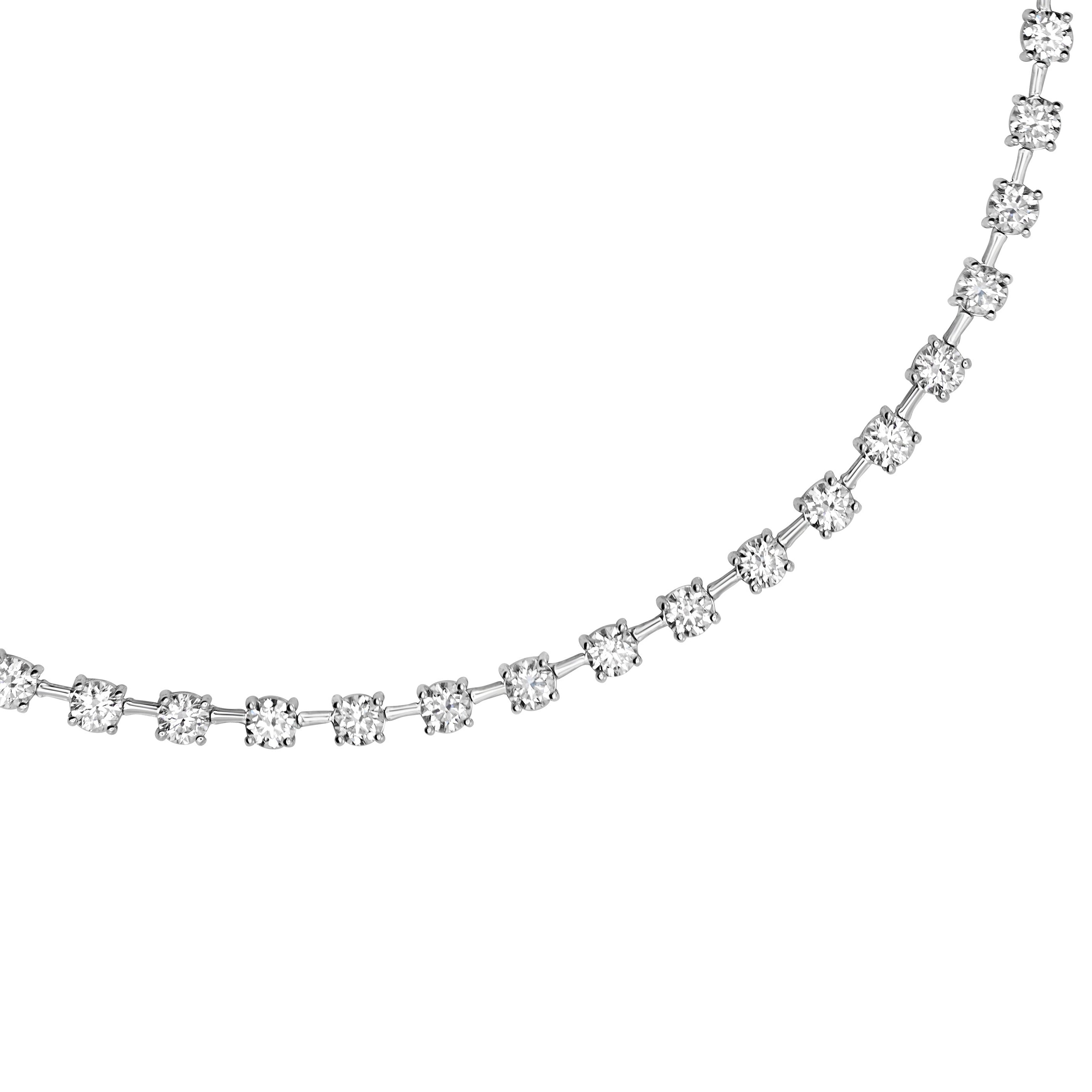 Diamond tennis necklace with space bar on a white background