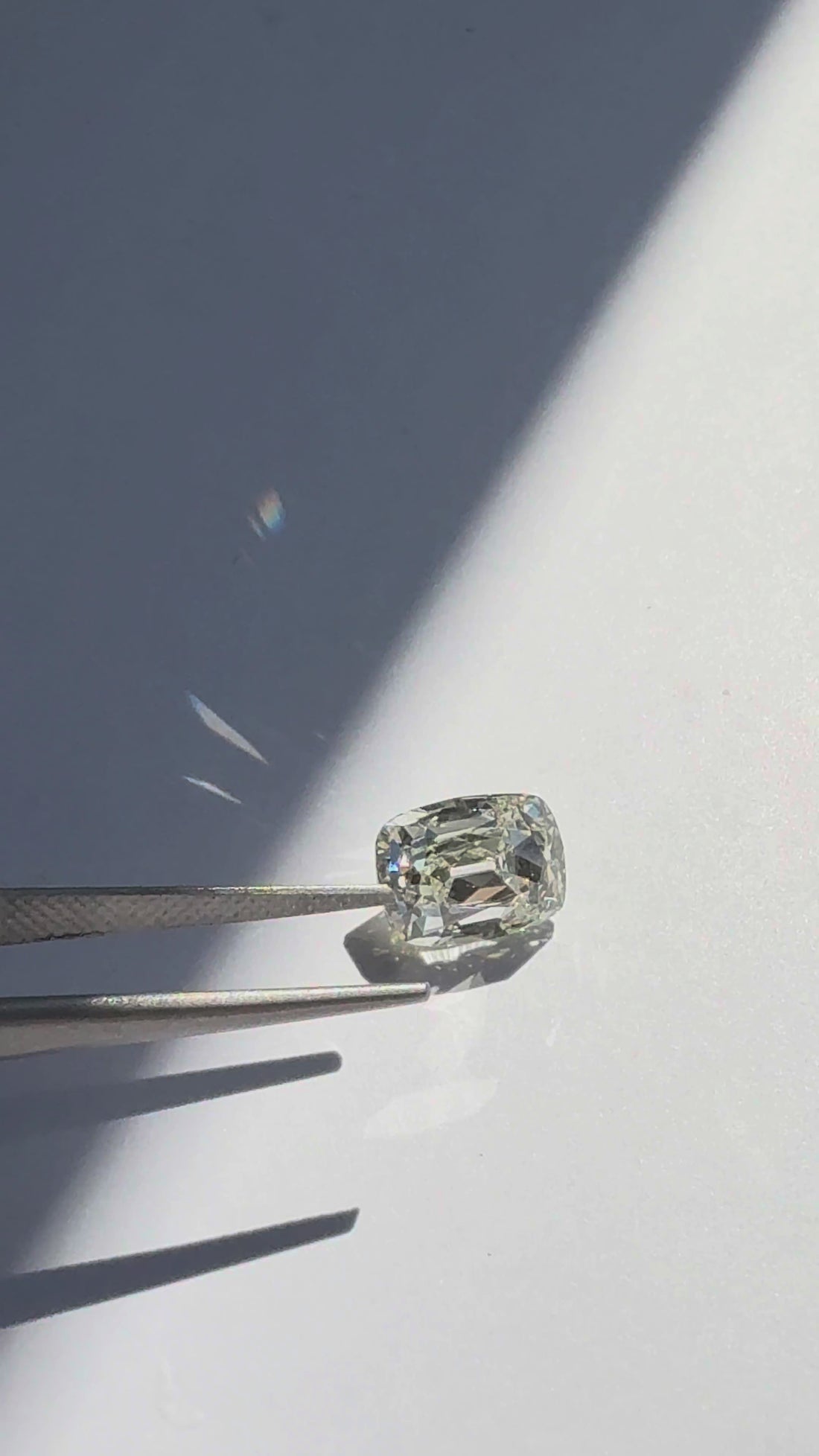 Video of diamond and diamond tweezer on white background